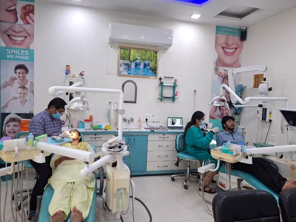 Dr. Tarun Kalra and Dr. Shweta Kalra treating patients
