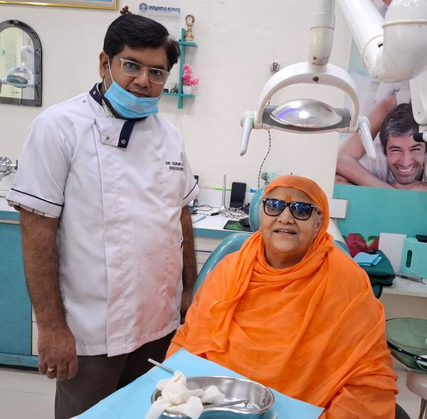 Dr. Tarun Kalra with a patient