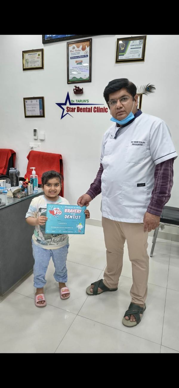 A young patient visiting Star Dental Clinic